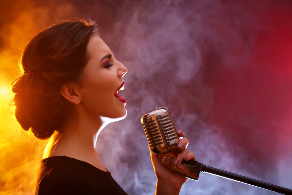 Singing into microphone