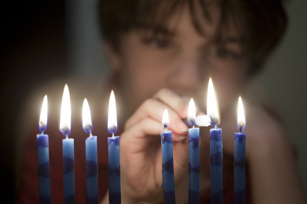 hanukkah boy candles menorah