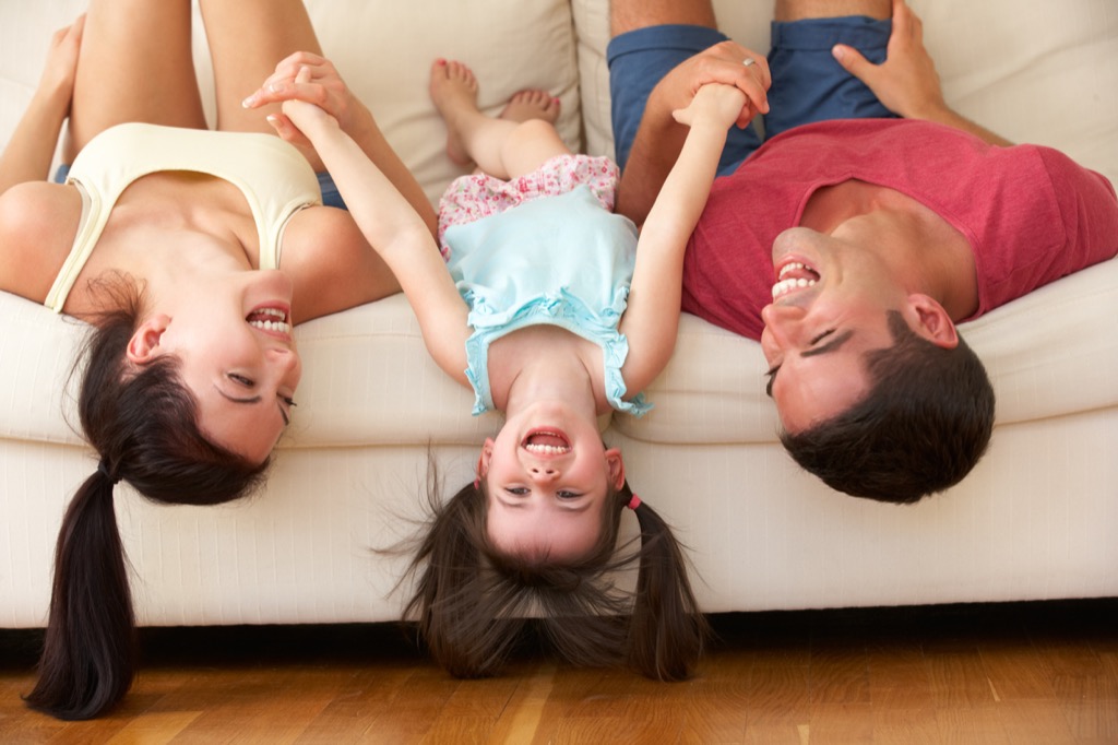 kids laughing on couch