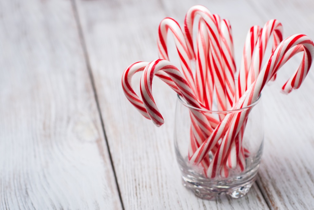 Candy canes in a clear glass