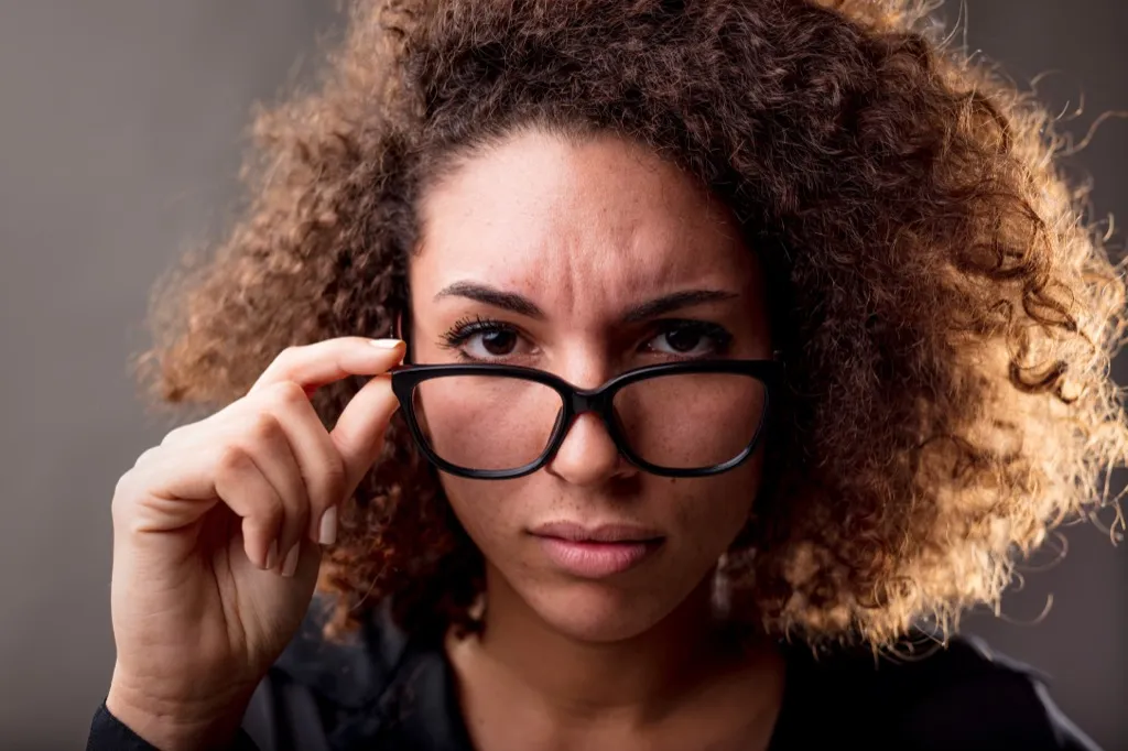 Woman with Glasses Sexist at Work