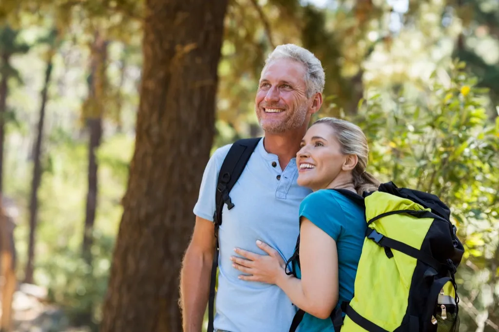 older couple hiking, over 50 regrets