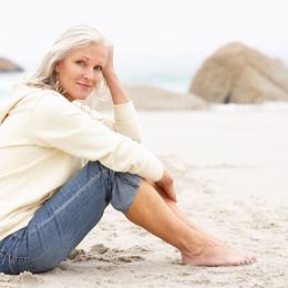 older woman on beach dating over 50