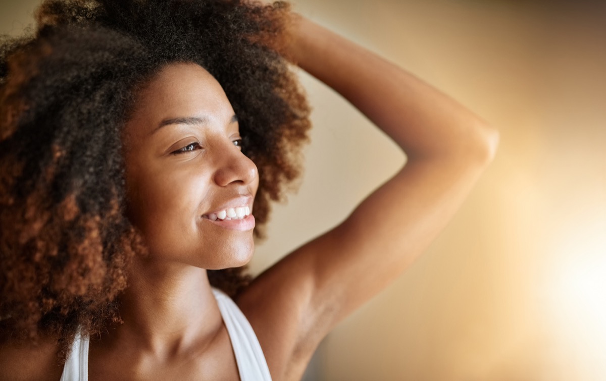 young black woman smiling in the morning