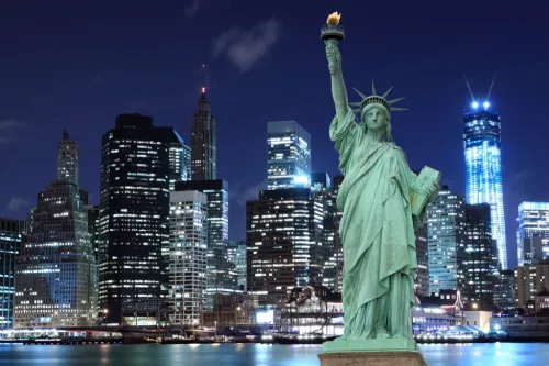 https://bestlifeonline.com/wp-content/uploads/sites/3/2018/01/new-york-city-skyline-statue-of-liberty.jpg?resize=500,333&quality=82&strip=all