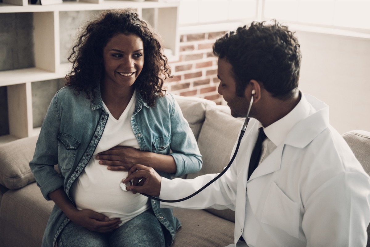 pregnant woman getting a doctor checkup
