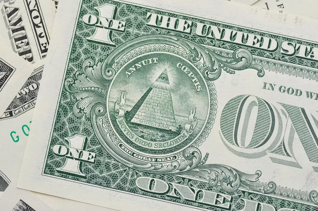 close up on pyramid on the back of a dollar bill