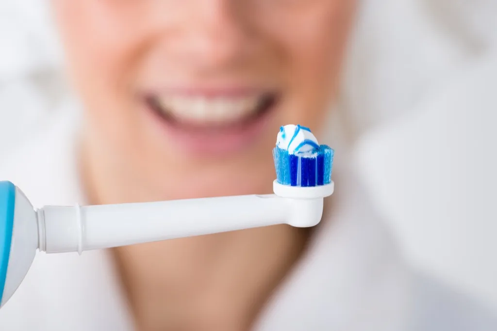 Woman with a Toothbrush Stop Lying to your Doctor