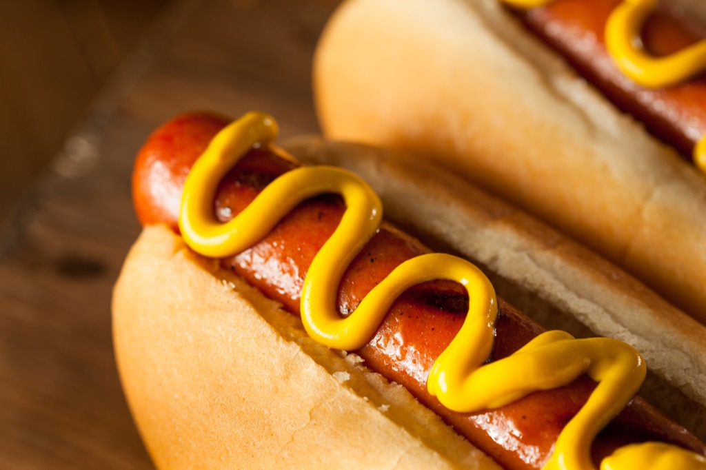 Close up of hot dogs with mustard