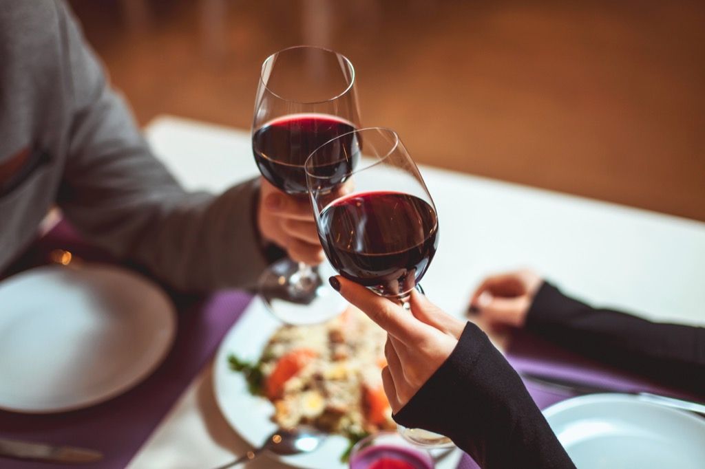 people drinking wine at dinner