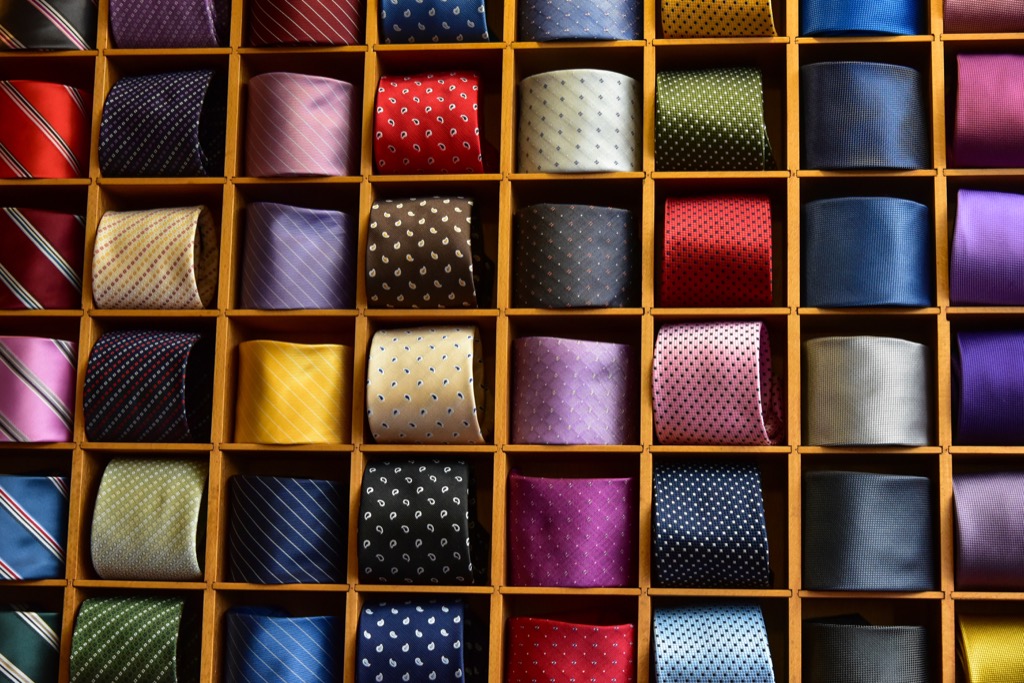 a bunch of ties in a tie organizer - how to dress over 50 