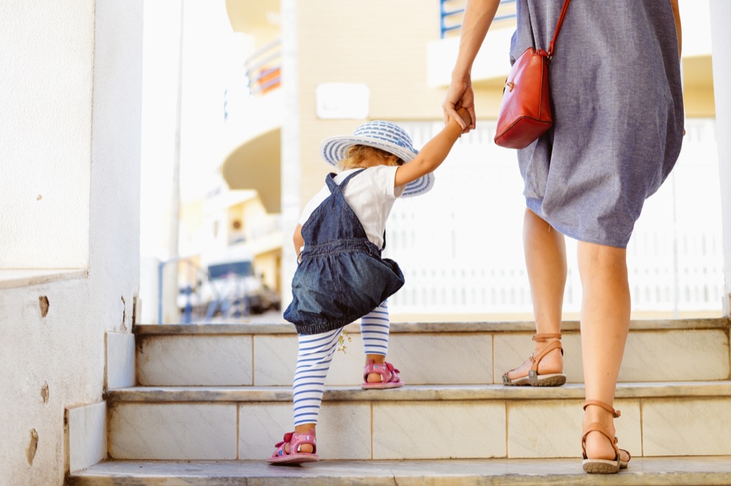 babysitter walking with toddler, ways parenting has changed