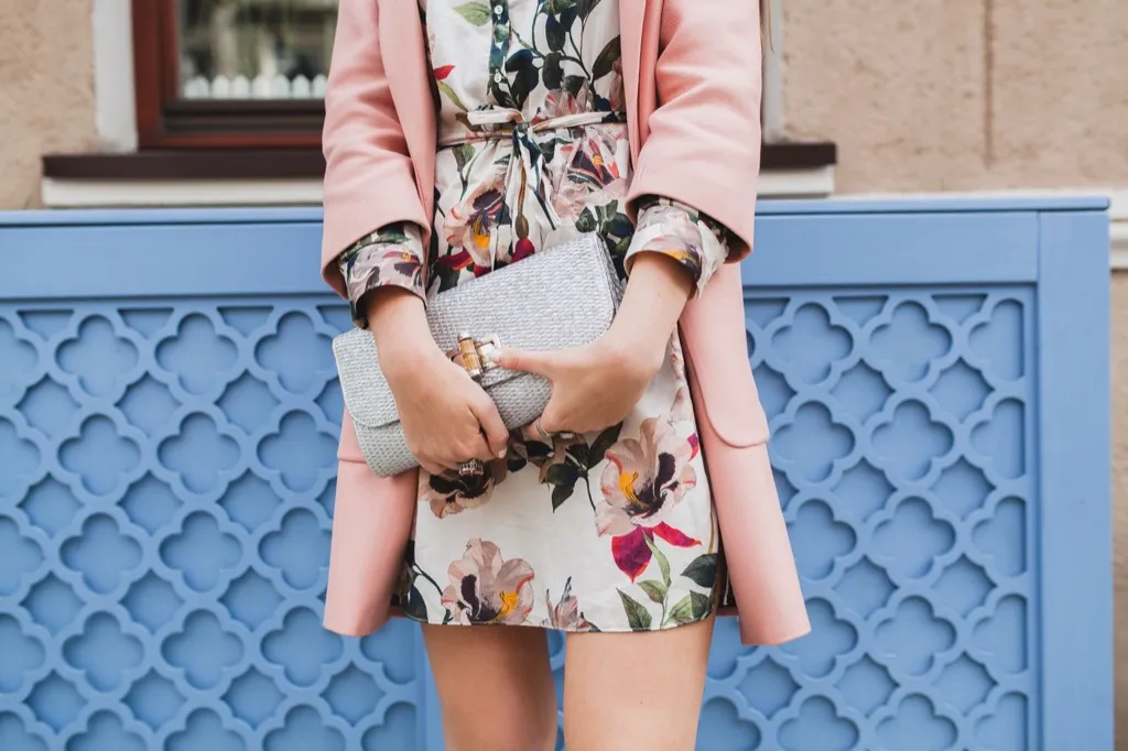 woman wearing a floral dress and blazer - how to dress over 50 