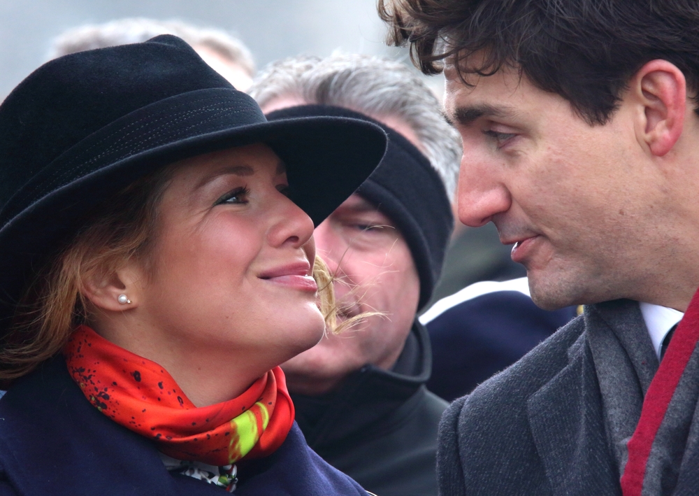 justin trudeau gazes lovingly at his wife. 