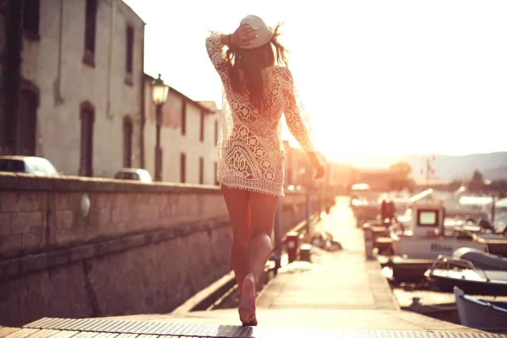 sunny streets woman dress walking