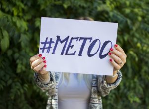 Woman holding a #MeToo sign