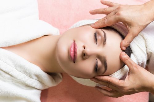 Woman Receiving Facial Massage Anti-Aging