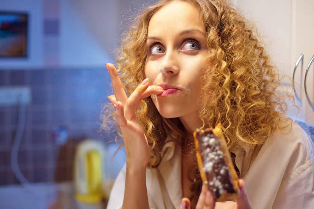 Woman Eating Donut Prevent Heart Disease
