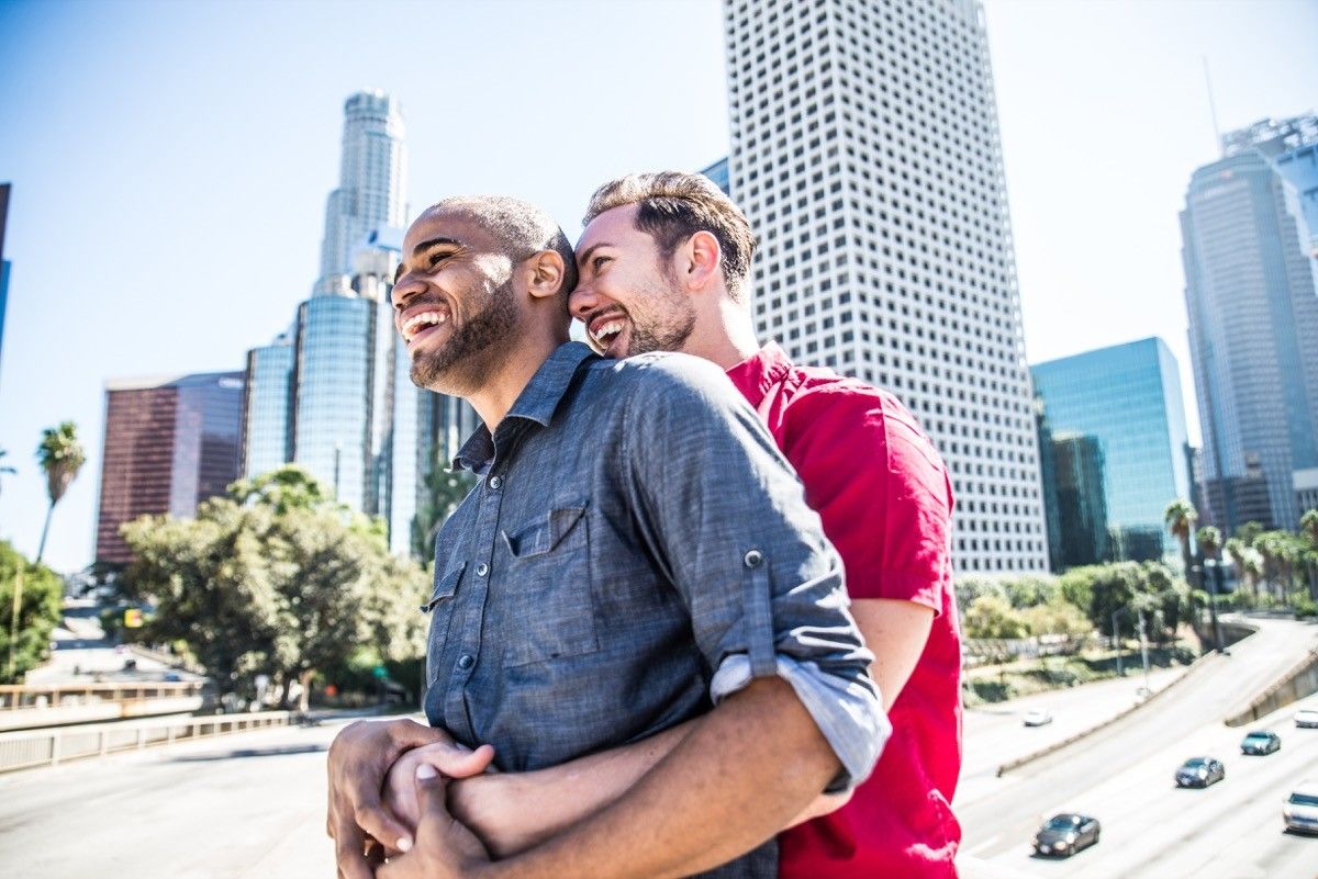 Gay couple enjoying a date in the city outside