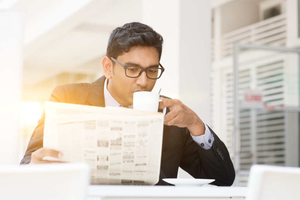 Man Reading the Newspaper, smart person habits