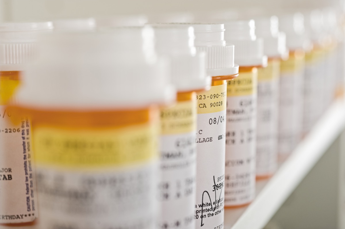 row of pill bottles for medicine