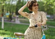 cheerful girl with bicycle