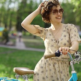 cheerful girl with bicycle