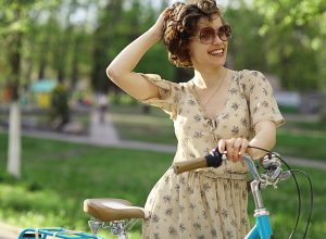 cheerful girl with bicycle