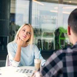 couples drinking coffee- signs hes not into you