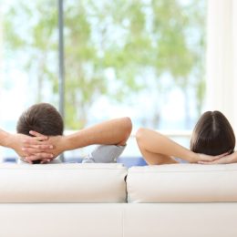 couple relaxing on couch