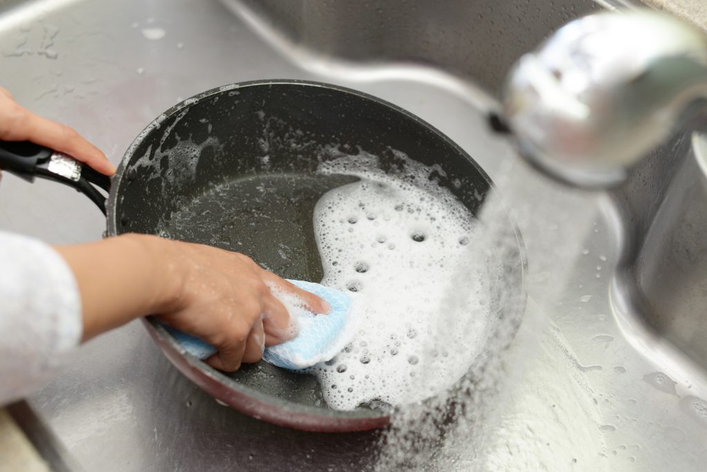 Cleaning Pan in Home