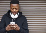teenager on smartphone differences between millennials and generation z