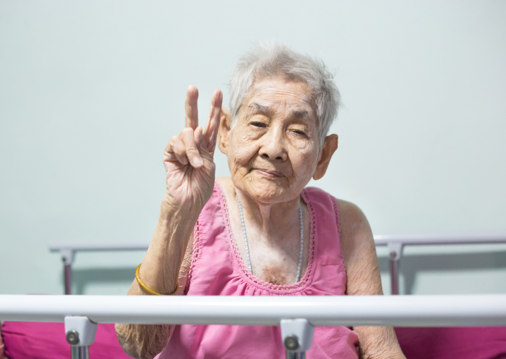 Elderly Woman Holding Peace Sign Yo Mama Jokes suicide forest