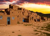 taos traditional adobe homes at sunset