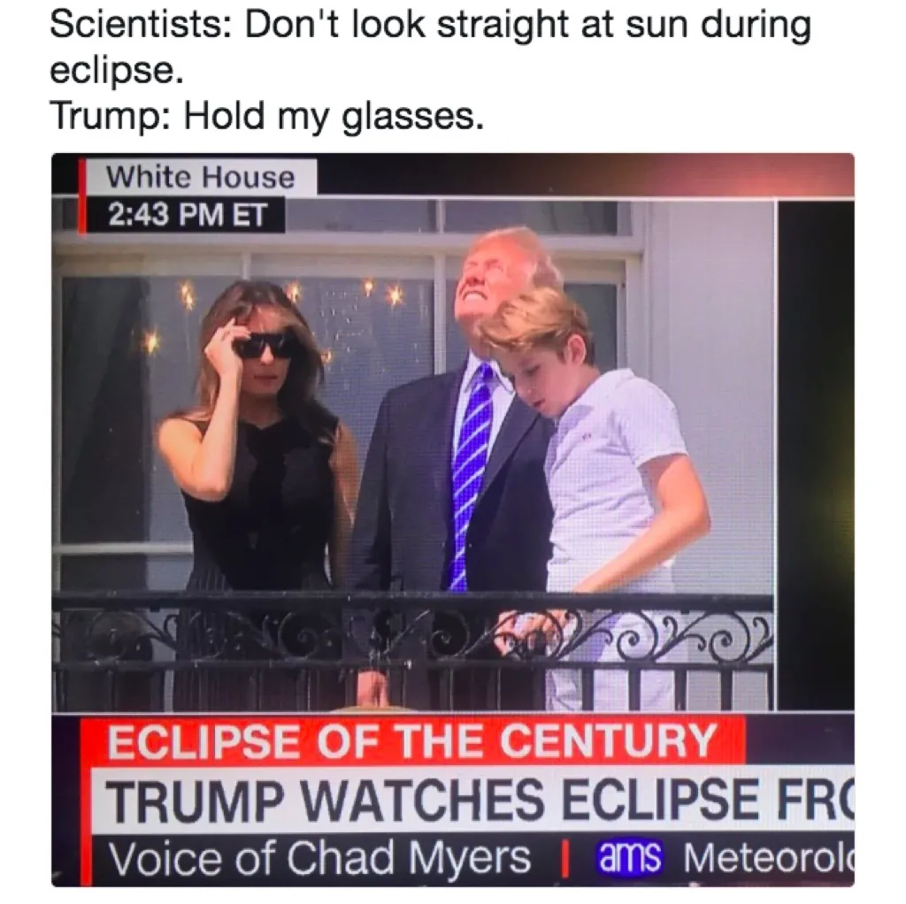 Donald Trump looks directly at eclipse