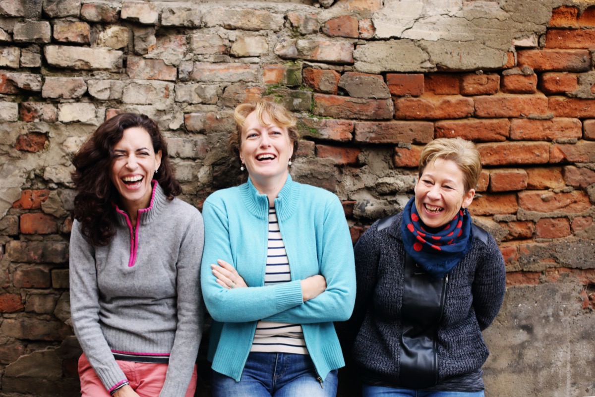 a group of women laughing together