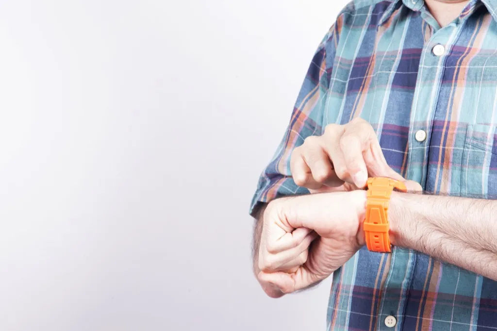 man with a rubber watch Social Etiquette Mistakes