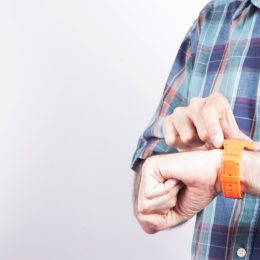man with plastic watch