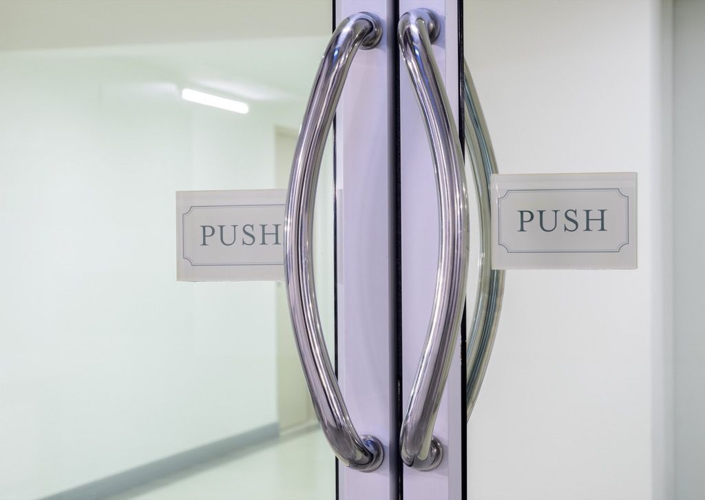 Double doors with push sign