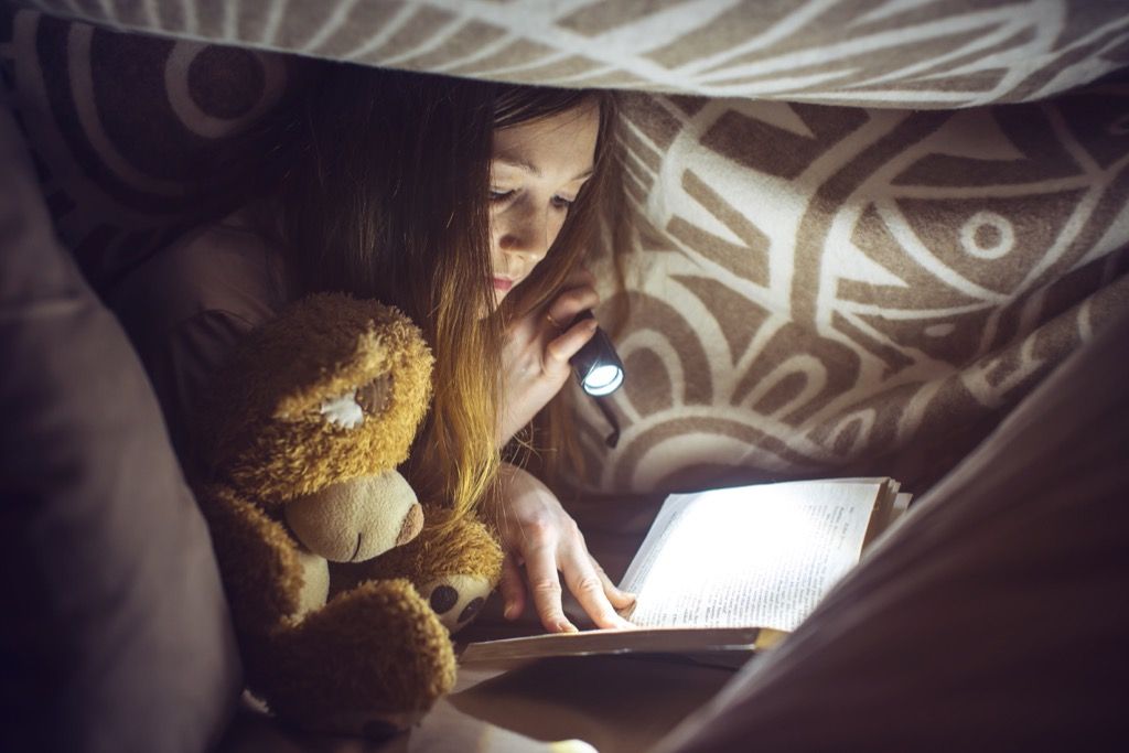 girl reading in dark Lies Kids Say