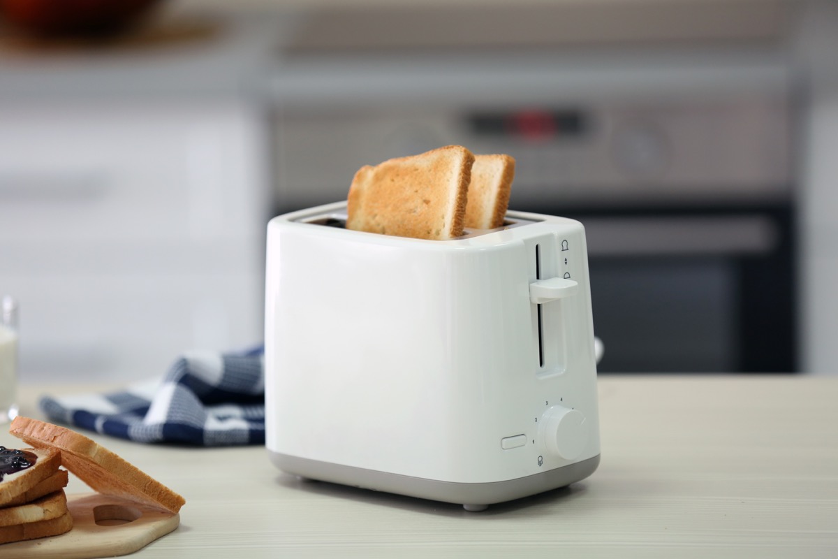 Bread popping out of toaster