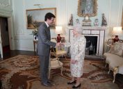 Justin Trudeau greets the Queen ahead of the Commonwealth state banquet at Buckingham Palace.