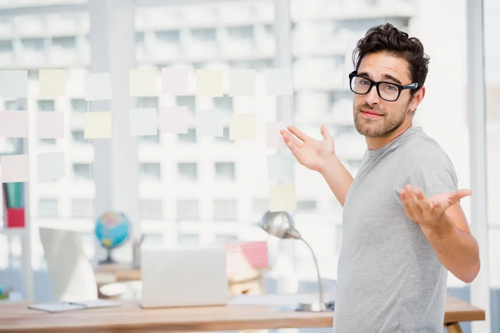 Man Shrugging Shoulders Because Life Isn't Fair 40 things you shouldn't believe after 40