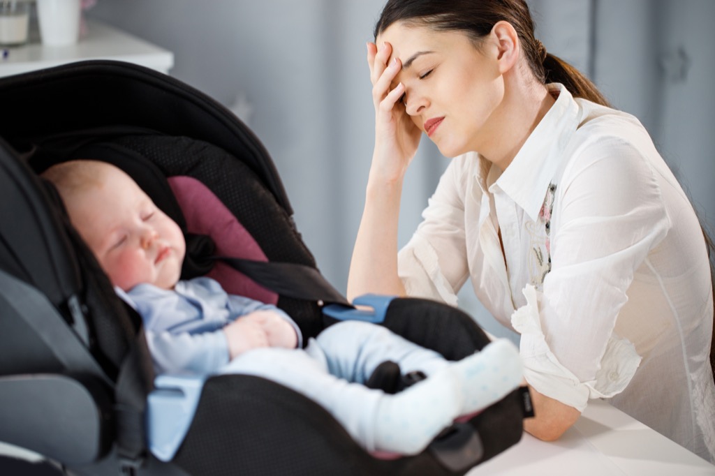 Unhappy Mother with Baby, parenting is harder