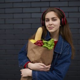 Woman Listening to Music While Grocery Shopping Mistakes