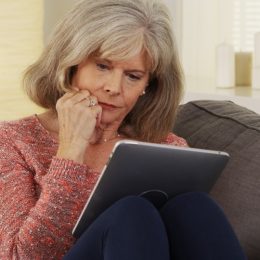 older person on ipad