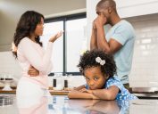 man and women disagreeing in front of daughter, parenting myths
