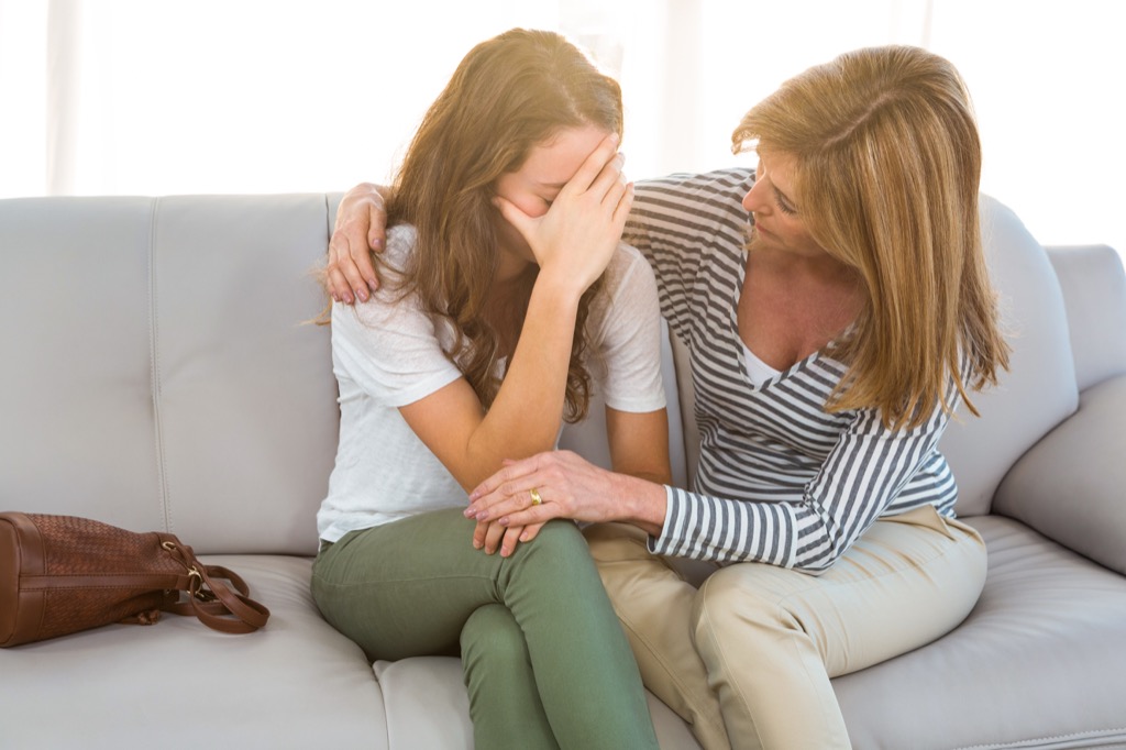 mom comforting daughter Moms Should Never Say