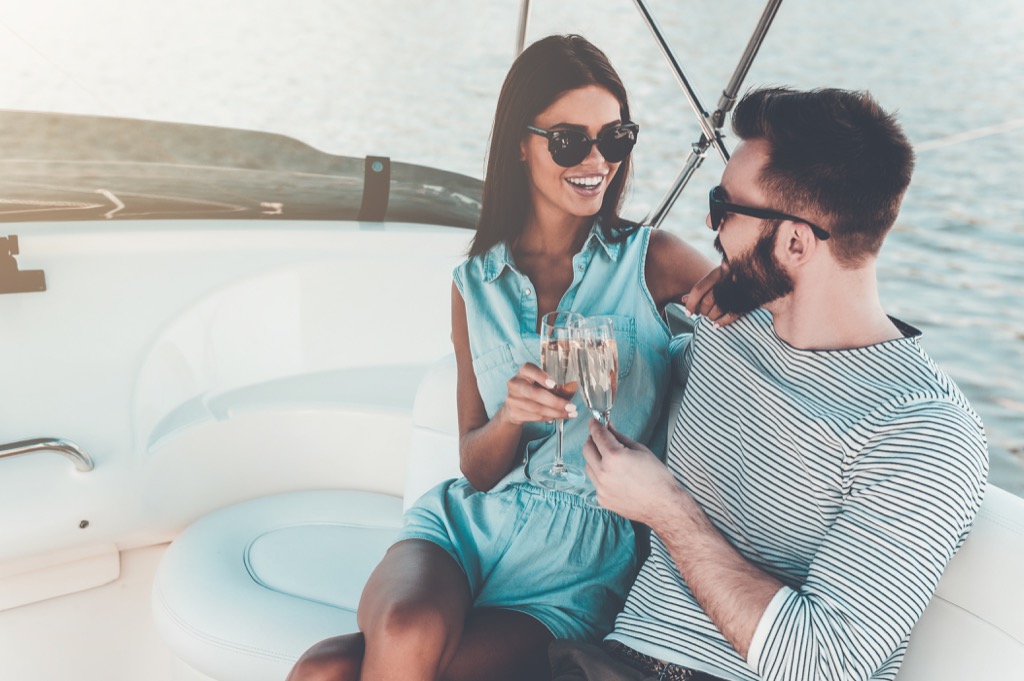 wealthy couple on a boat