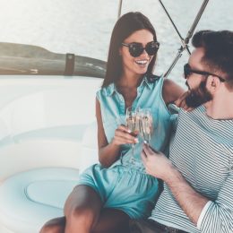 wealthy couple on a boat